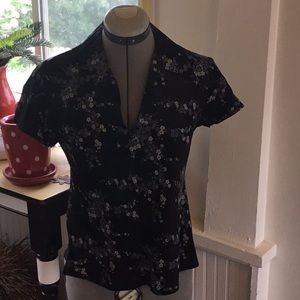 Black rayon top with blue and off-white flowers